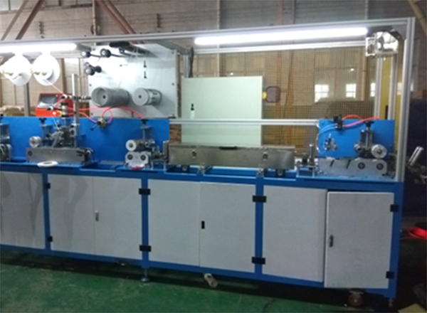 Sticking machine for pressure sensitive adhesive tape